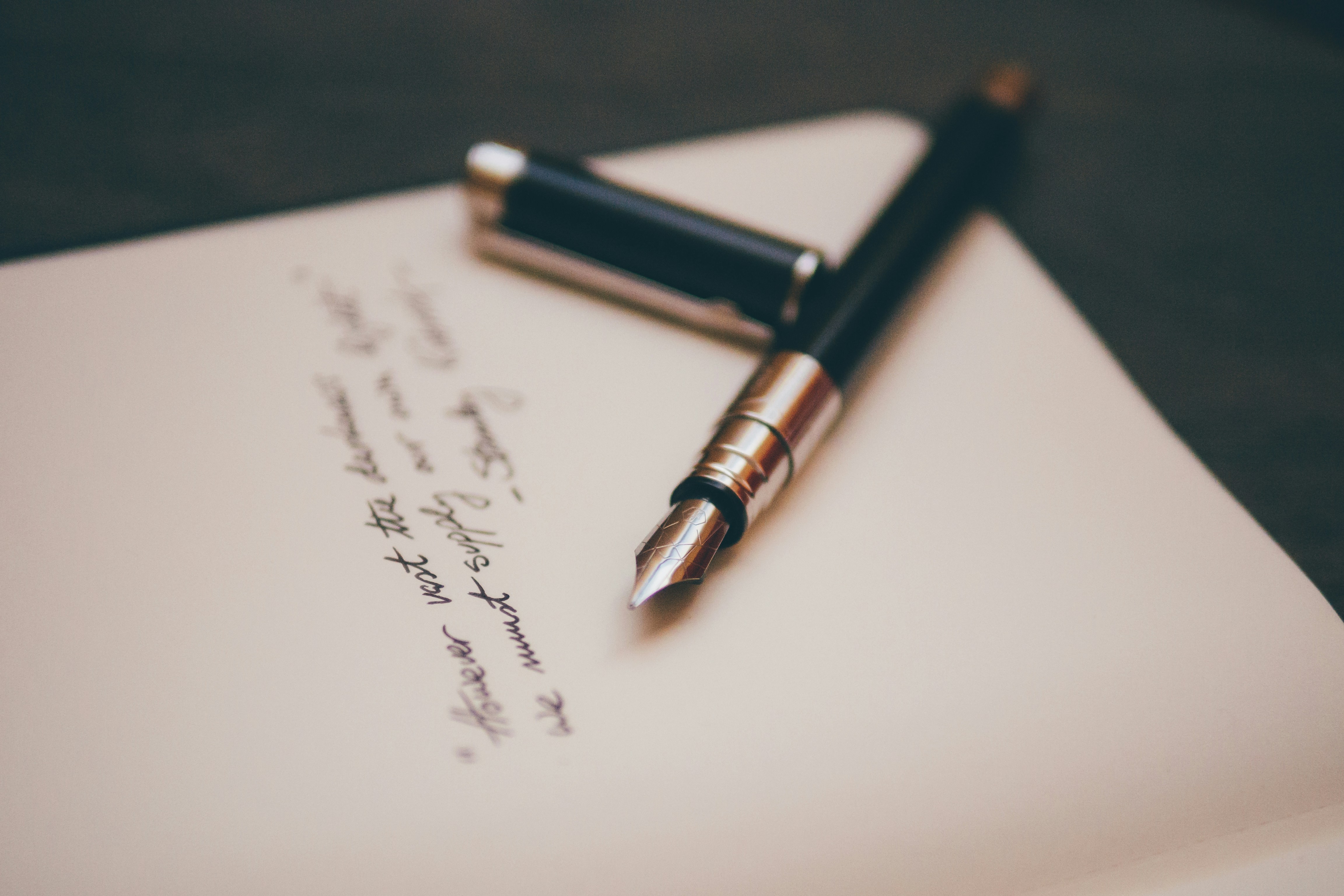 An open family photo album with handwritten captions